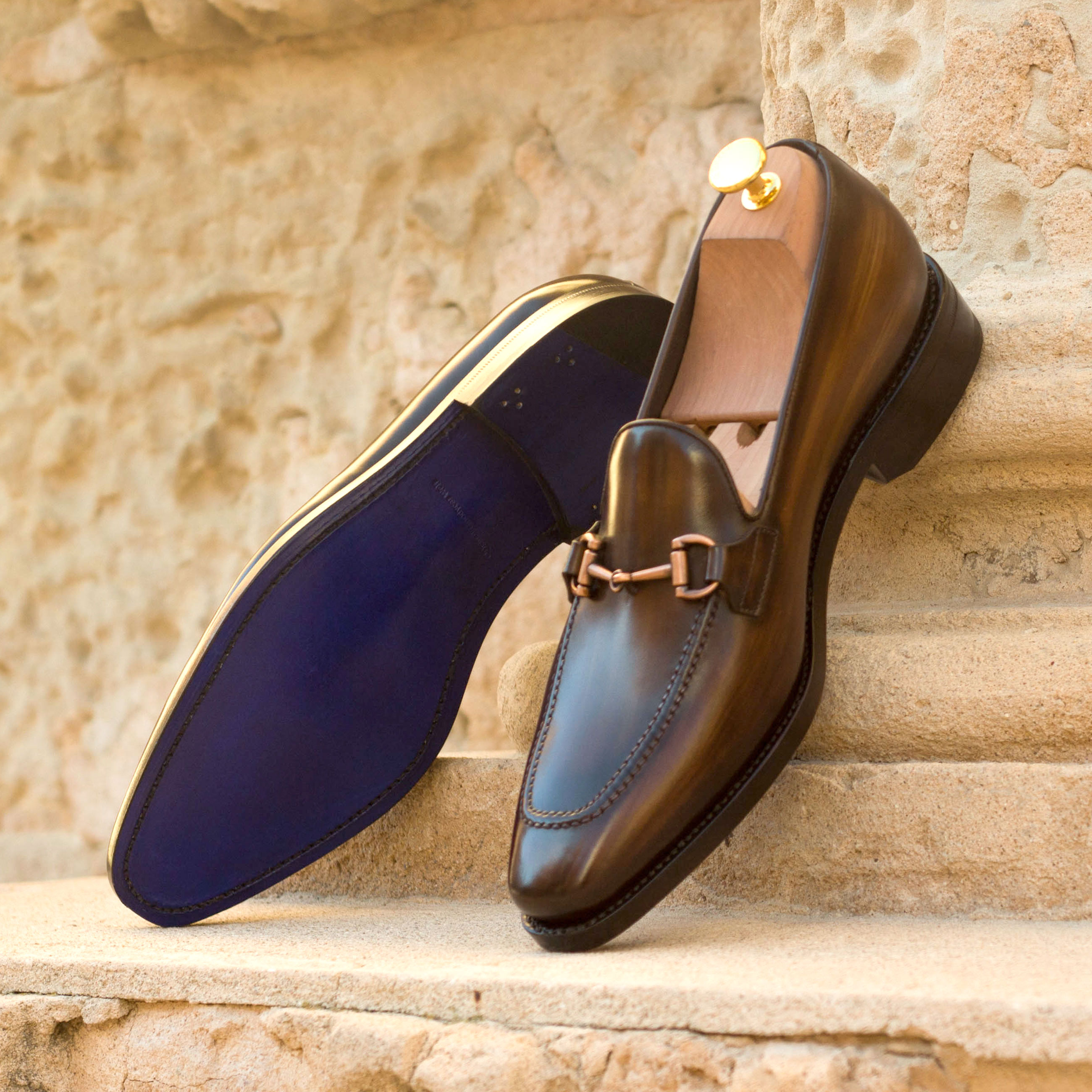 Slip-on loafer custom dress shoe with hand-painted patina finish.