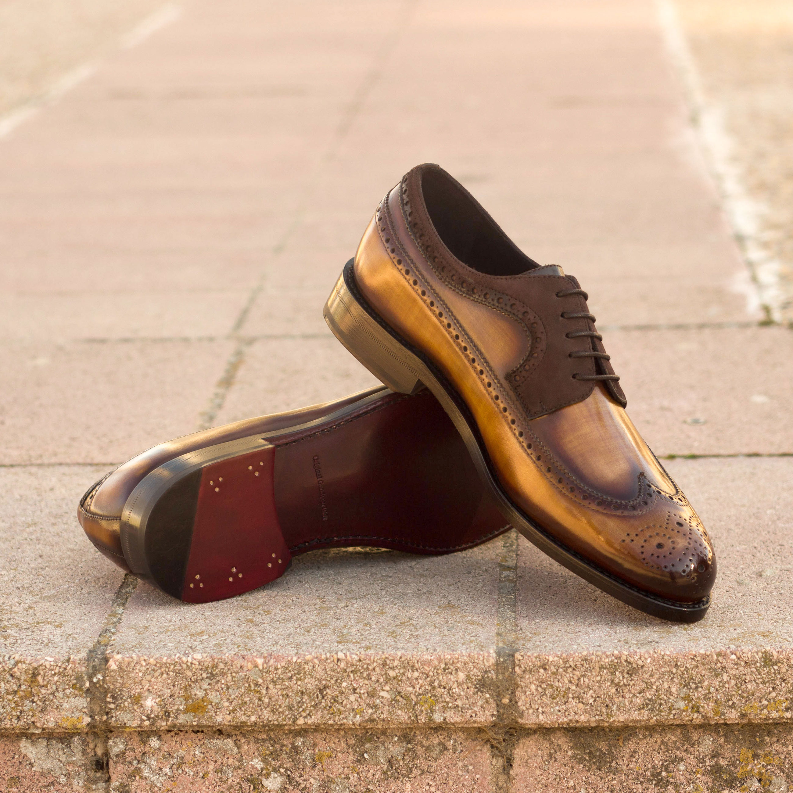 Longwing blucher custom dress shoe with hand-painted patina finish.